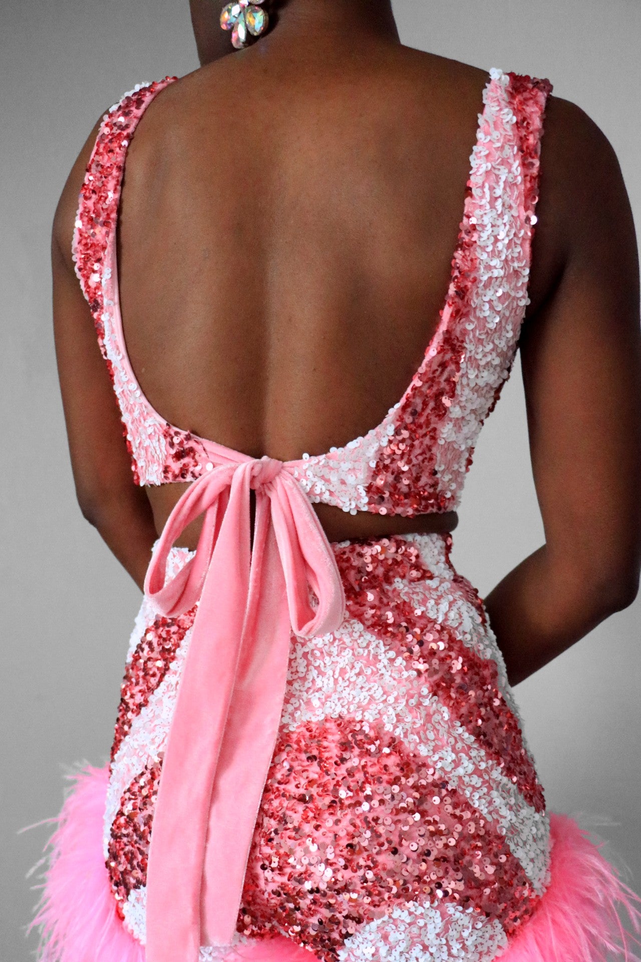 Pink And White Sequin Swirl Sleeveless low back crop top back with velvet tie back detail