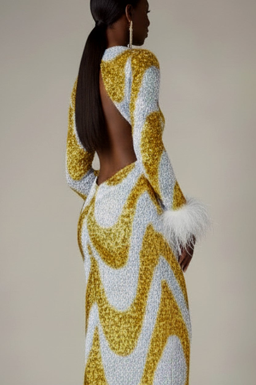 Back view of yellow sequin maxi dress with feather trim gala wear