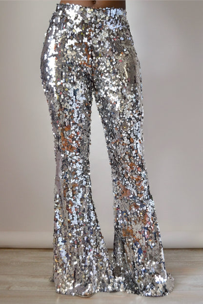 Full frontal silver sequin pants on a plain background