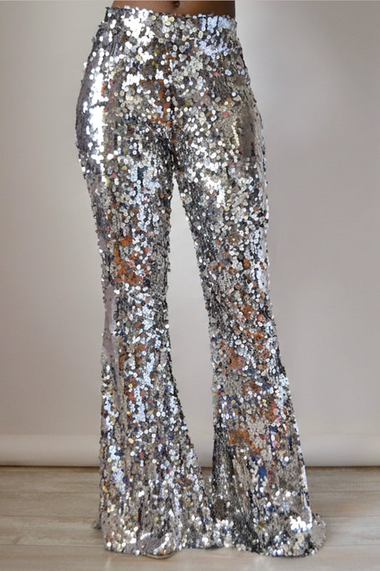 Full frontal silver sequin pants on a plain background