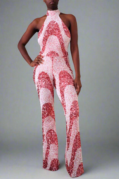 Front view of model wearing Designer halter sequin jumpsuit handcrafted in NYC